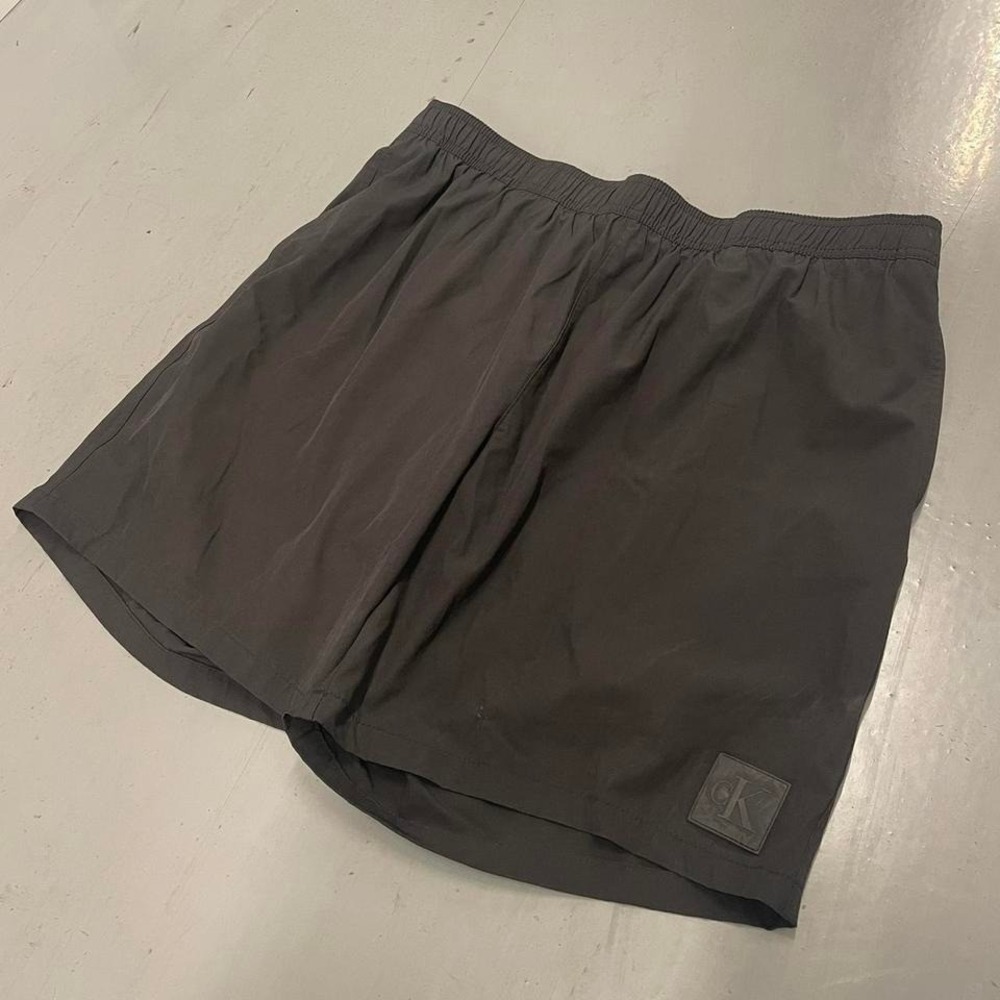 Calvin‎ Klein black swim shorts with rubber CK patch